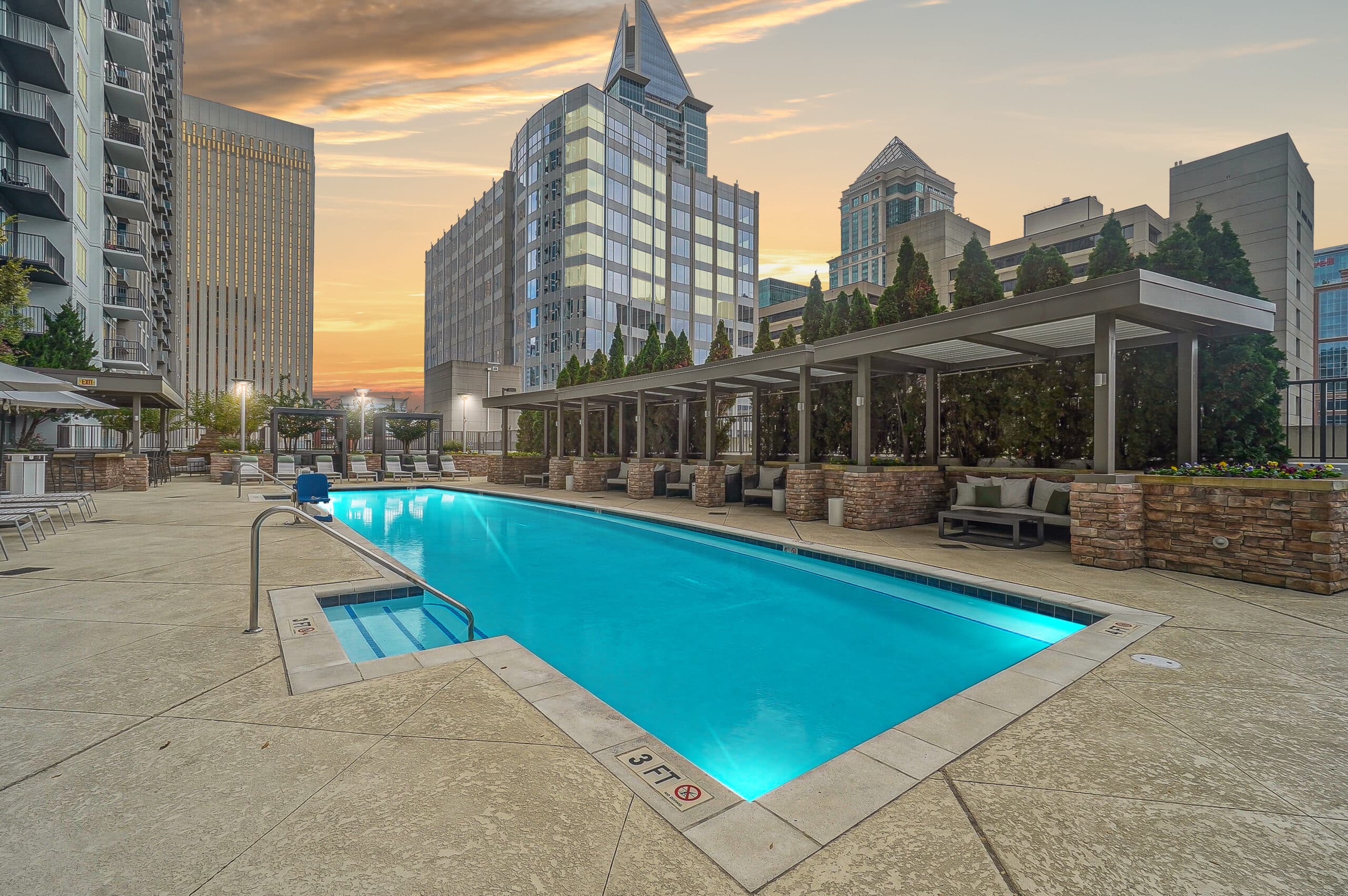 BellUptownCharlotte PoolDusk June2025 HighRes
