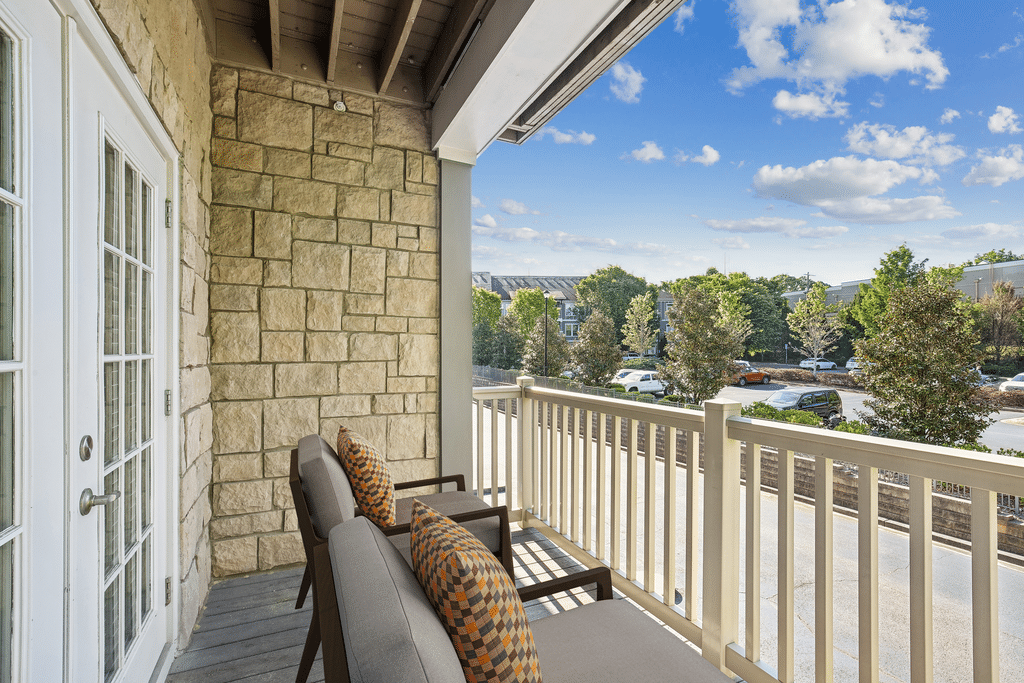 The Regency at Johns Creek Walk VirtuallyStagedPorch(1) December2024 HighRes
